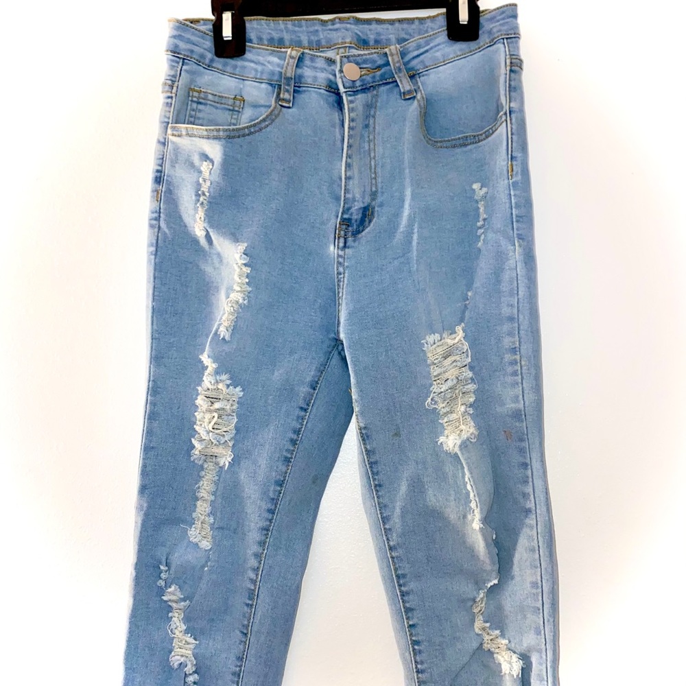 high waisted ripped jeans light washed